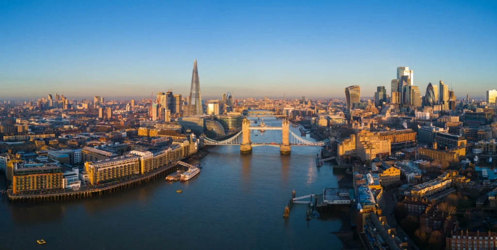 London skyline at sunset with the Shard and river below
